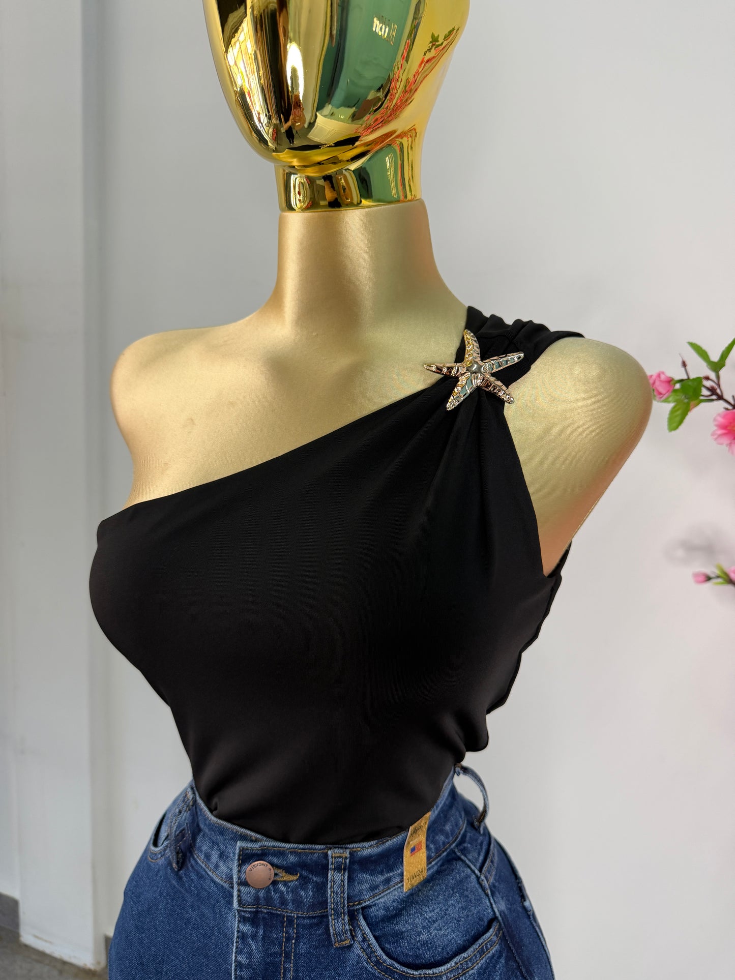 Blusa negra manga estrella