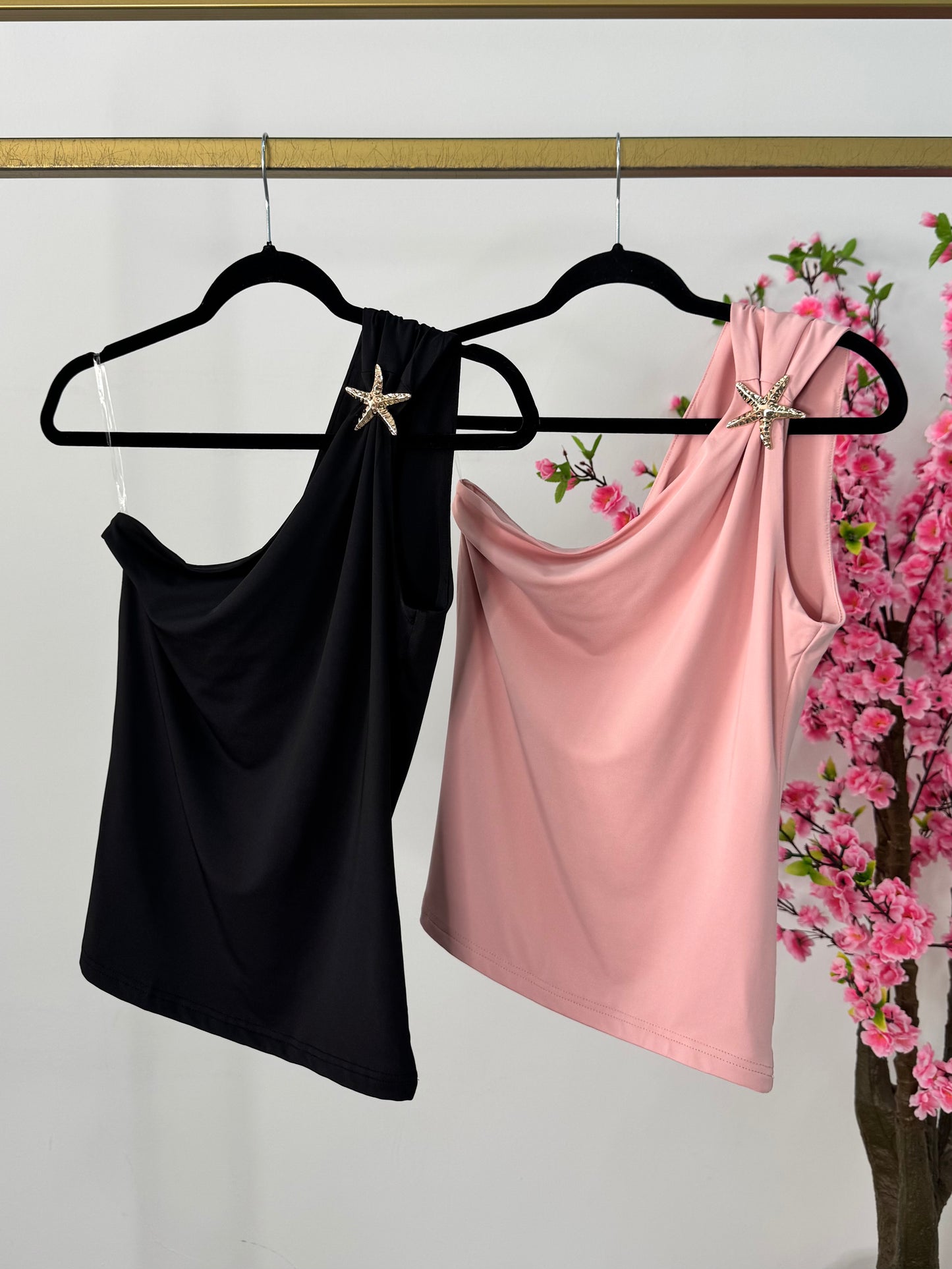 Blusa negra manga estrella