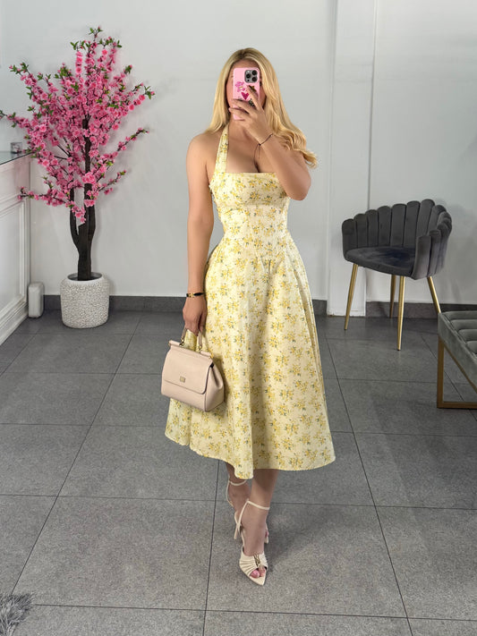 Vestido midi amarillo floreado