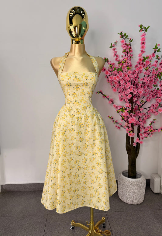 Vestido midi amarillo floreado
