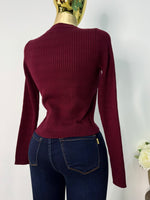 Sueter vino moños dorados