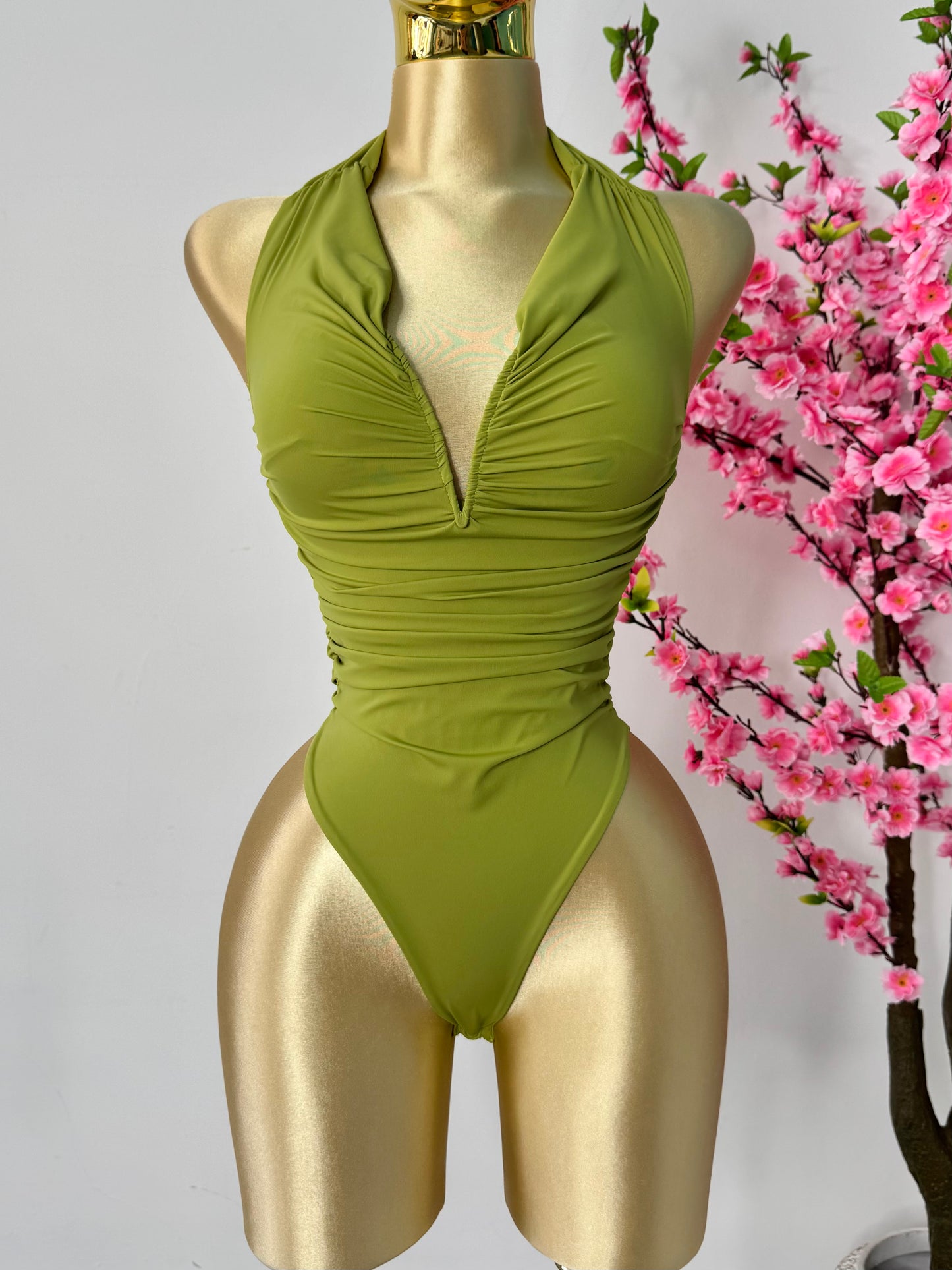 Body verde con escote