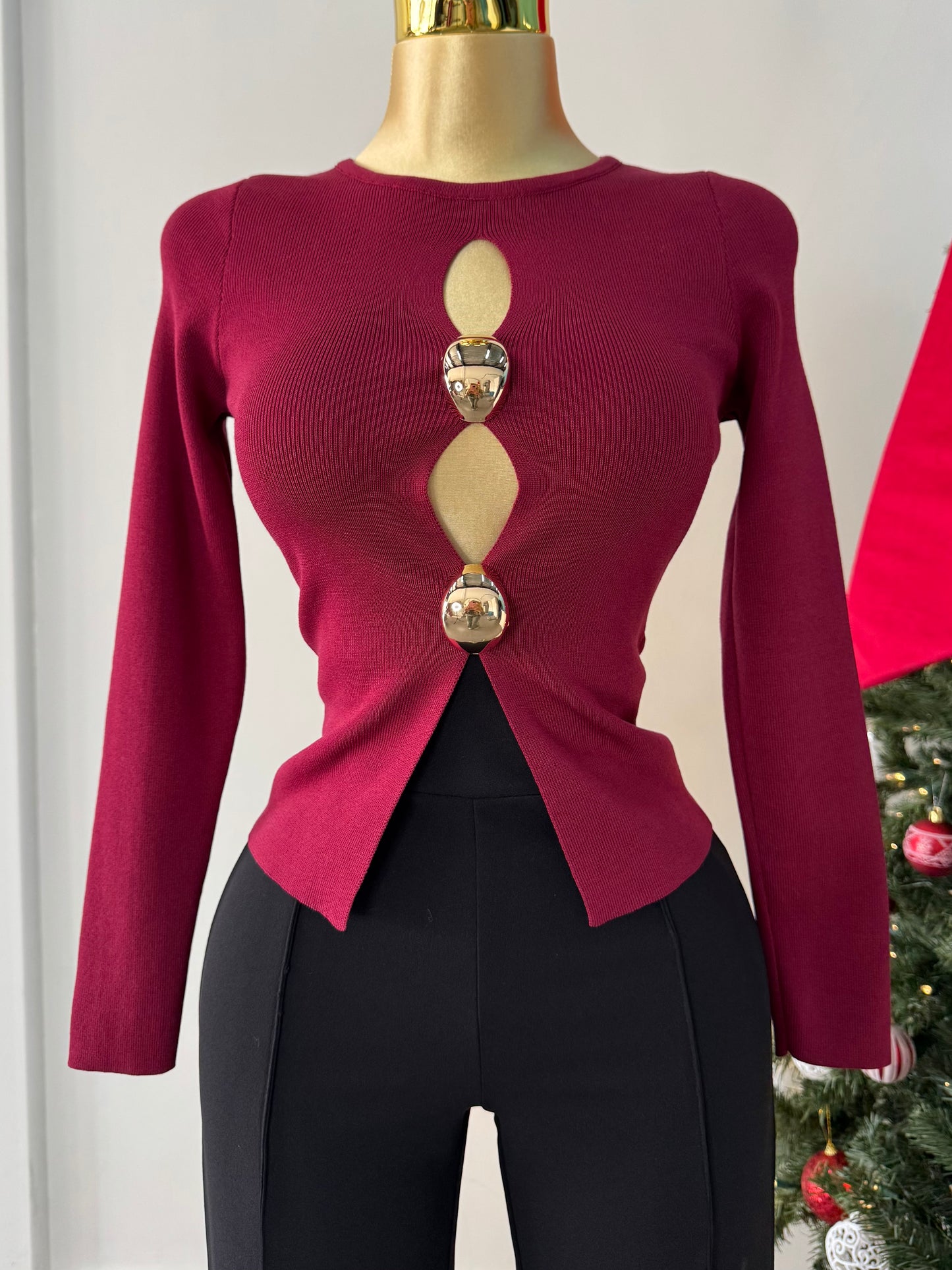 Blusa burgundy detalle dorado