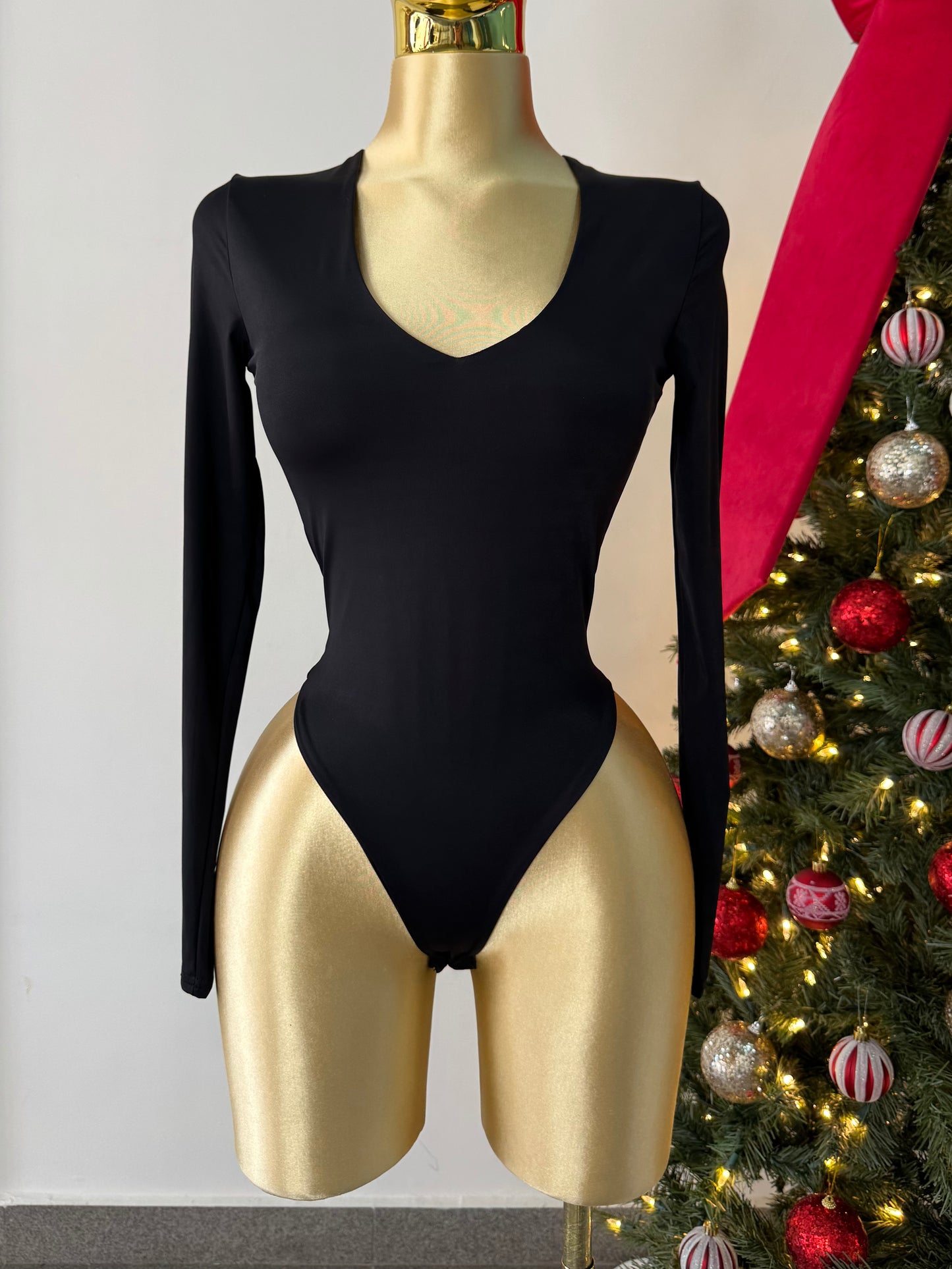 Body libra manga larga negra cuello v