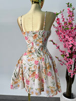 Vestido corto floreado tonos naranja