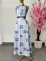 Set azul estampado negro top y falda