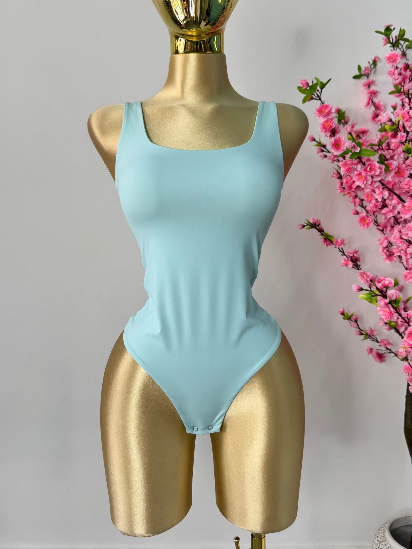 Body licra azul menta