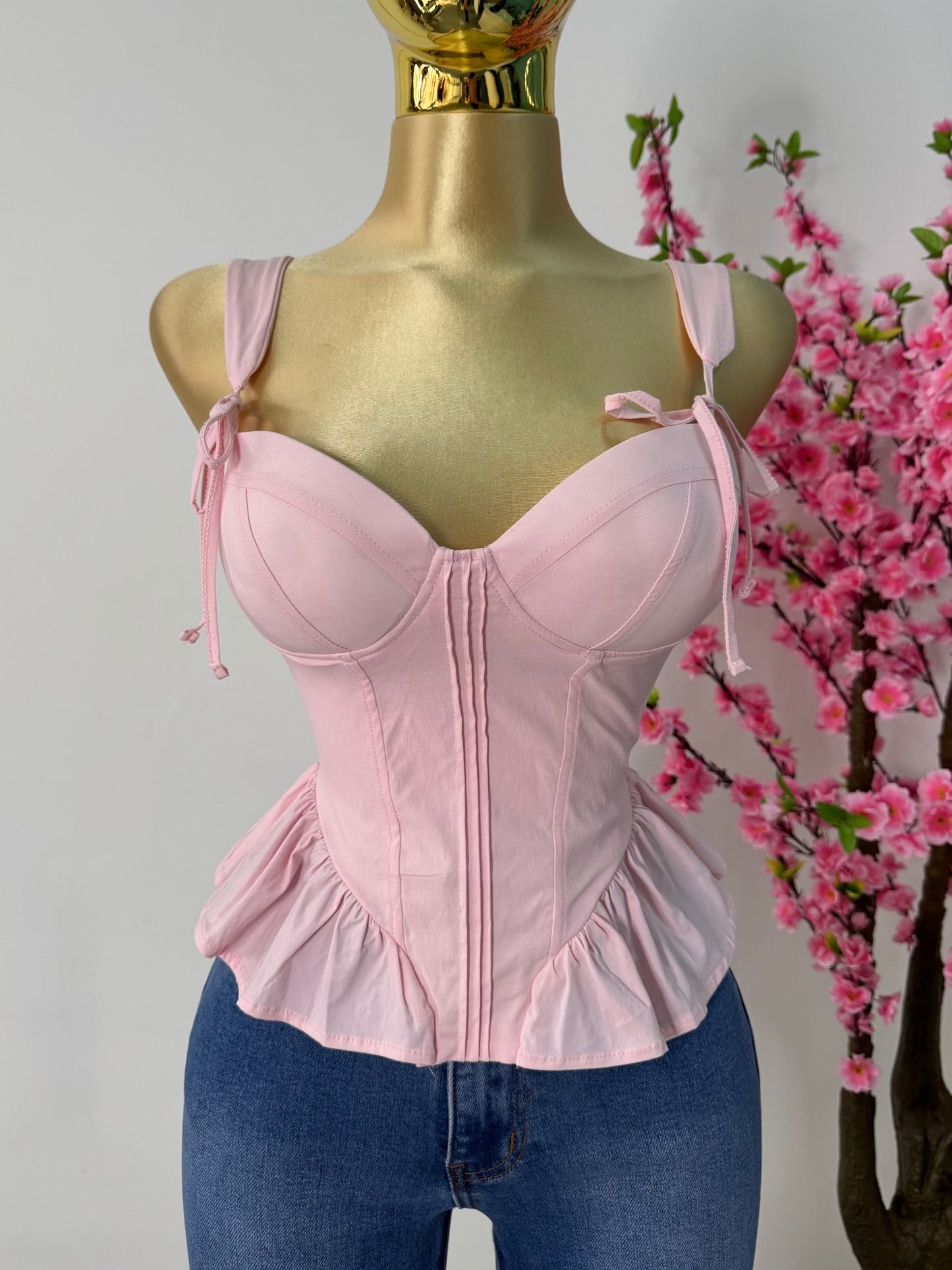 Top rosa pastel con copas