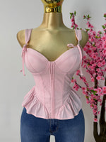 Top rosa pastel con copas