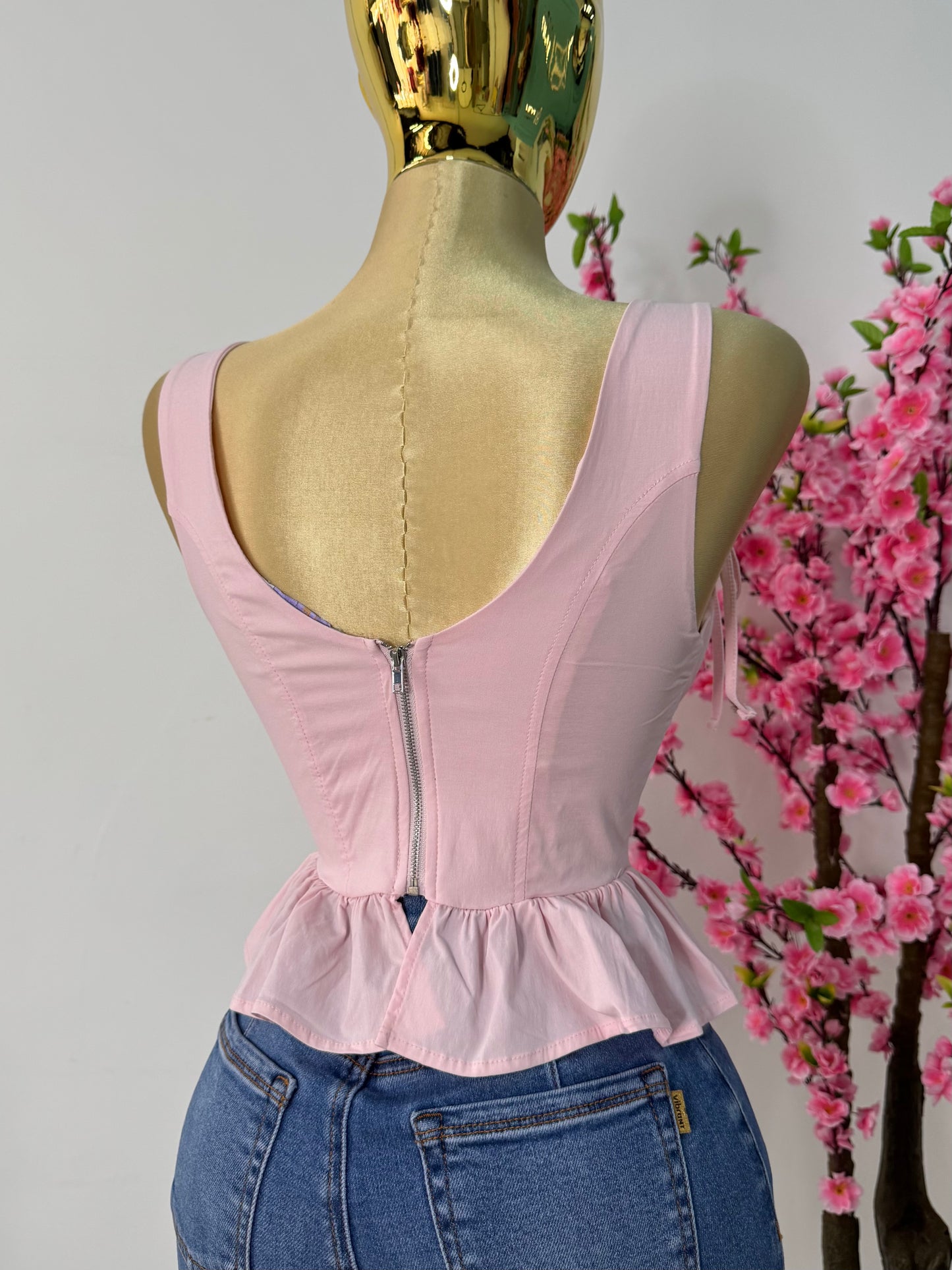Top rosa pastel con copas