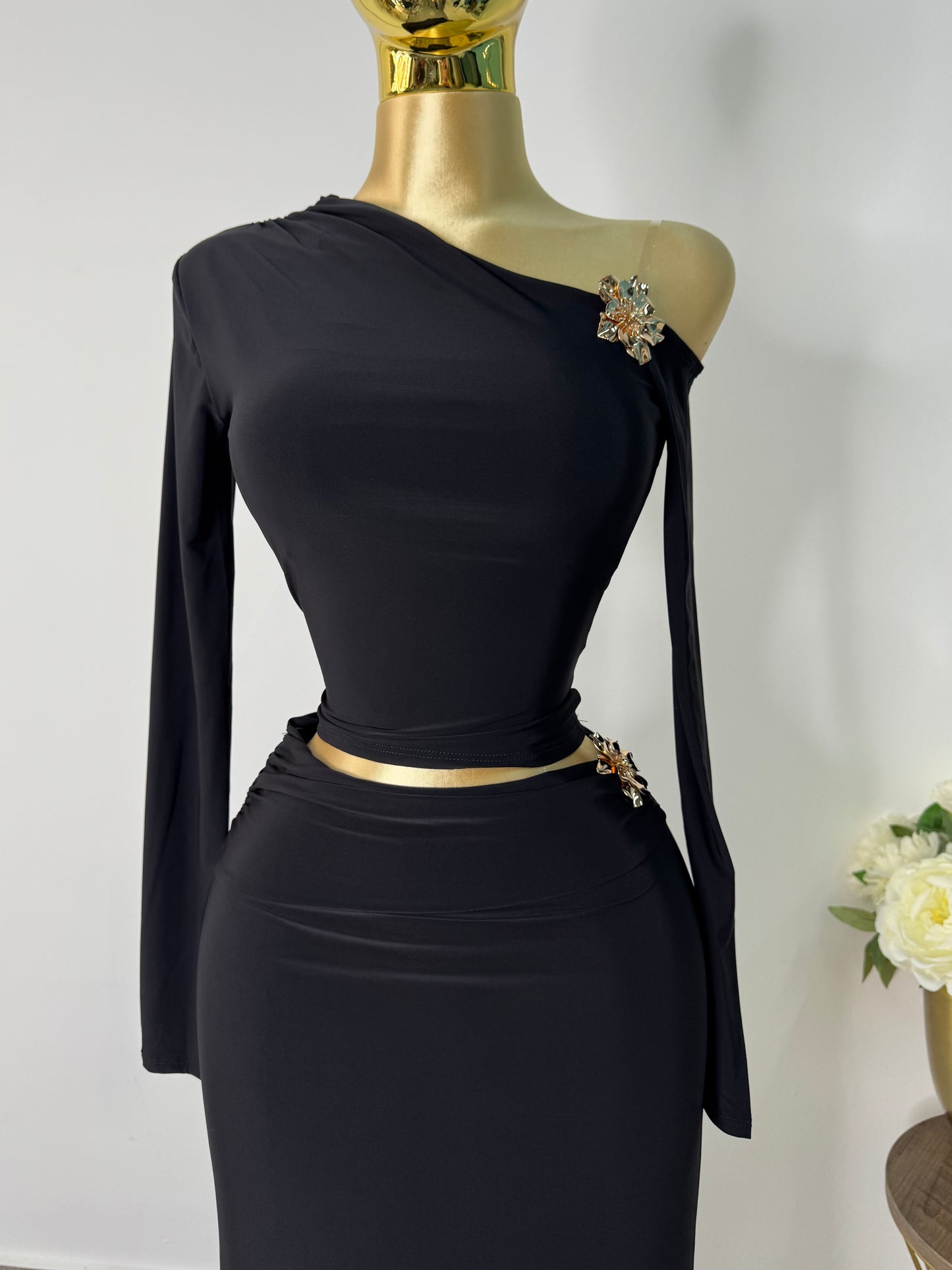 Set licra negro con detalle dorado