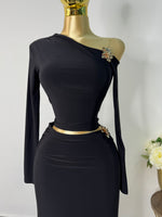 Set licra negro con detalle dorado