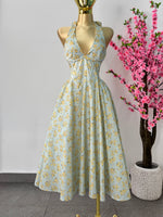 Vestido midi azul claro floreado