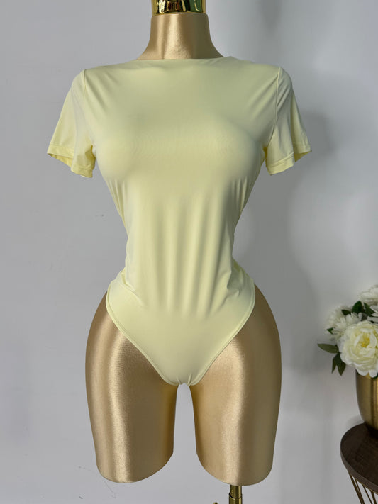 Body licra amarillo manga corta