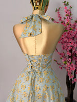 Vestido midi azul claro floreado