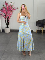 Vestido midi azul con flores amarillas