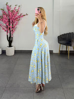 Vestido midi azul con flores amarillas